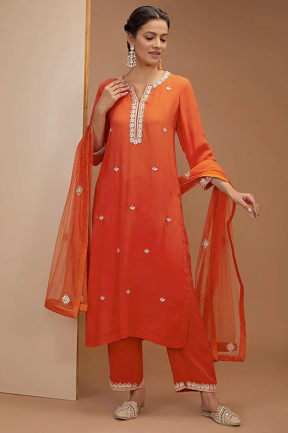 Gota Patti Embroidred Kurta Set In Tangy Red Color.